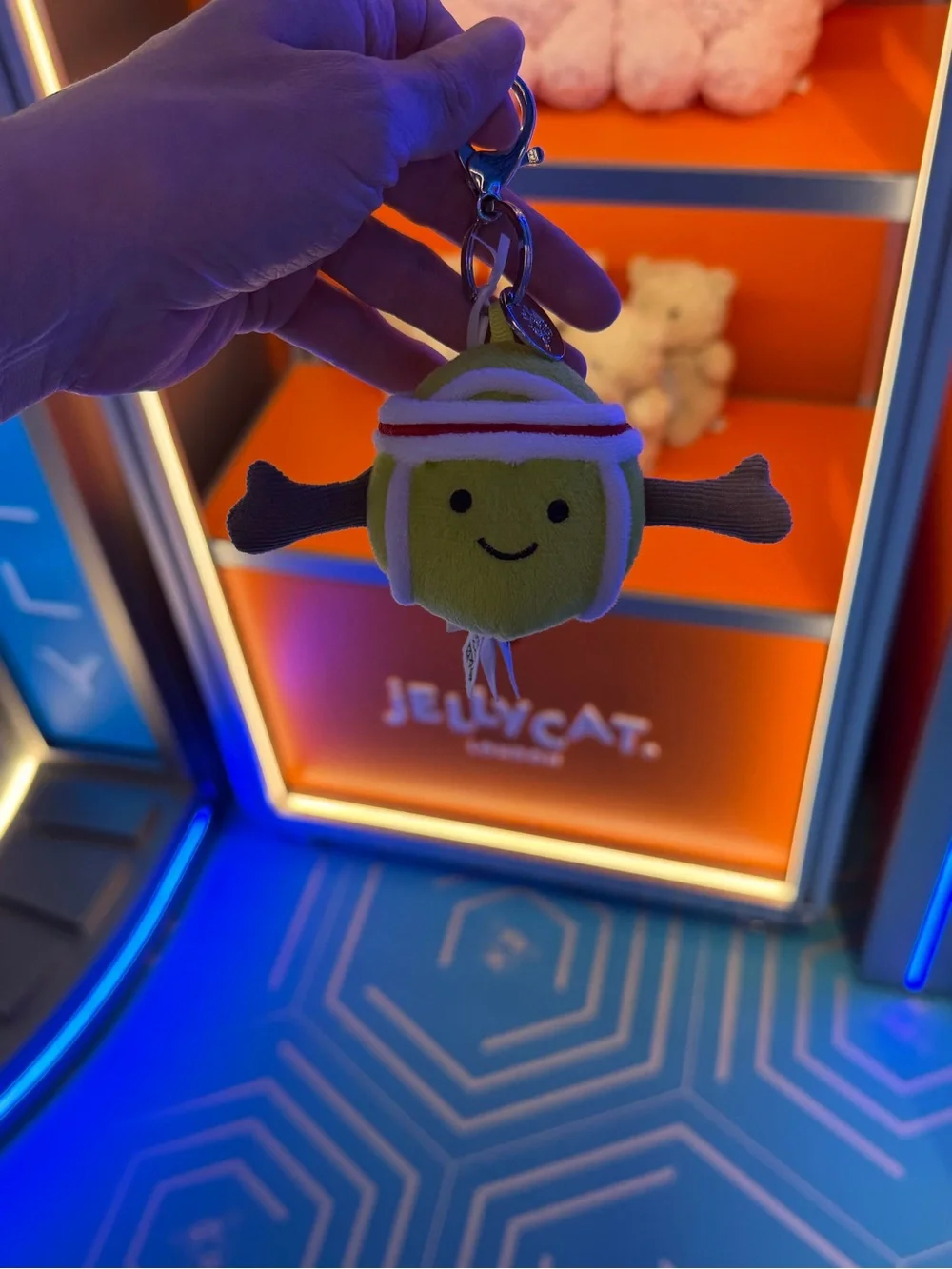 Jellycat Lime Yellow Tennis Ball Keychain with Brown Arms